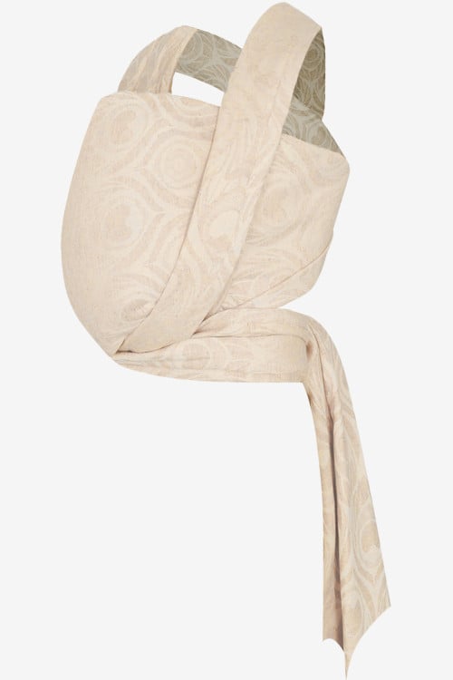 Beige baby wrap with peacock feather print in a linen blend